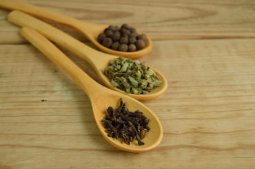 wooden spoon with natural ingredients for DIY natural face skin care routine.