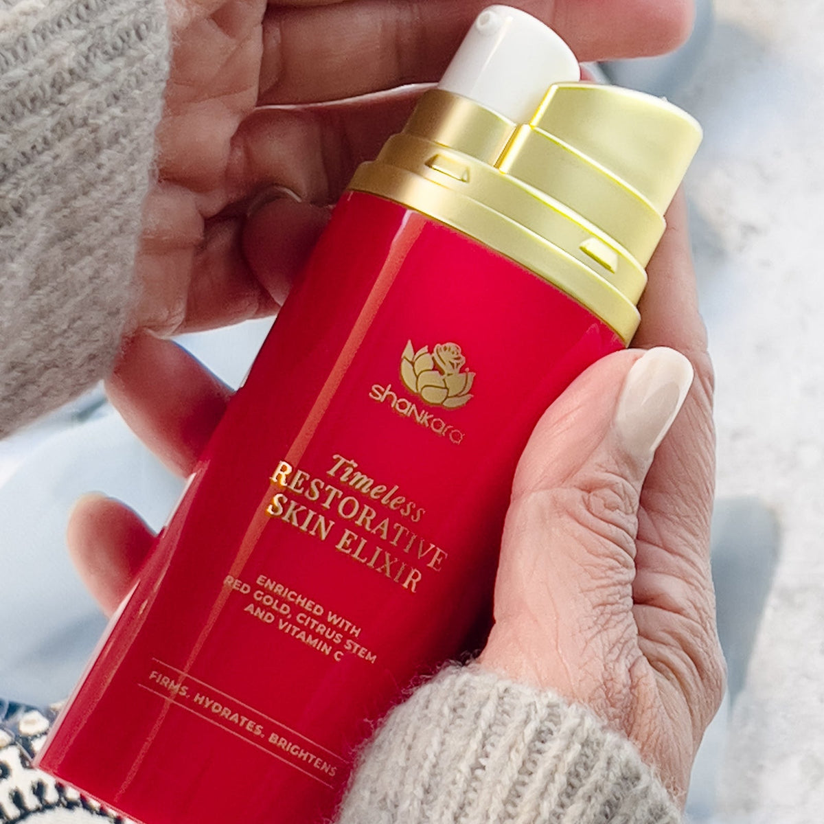 Timeless Essentials elixir in hands